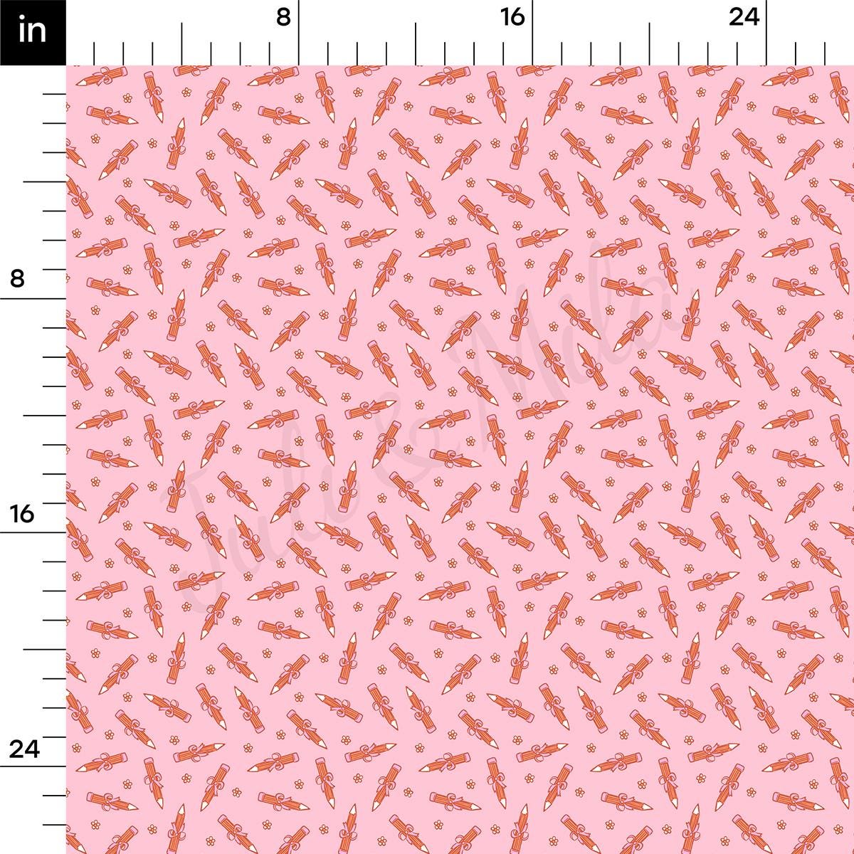 a ruler with a pink and orange pattern on it