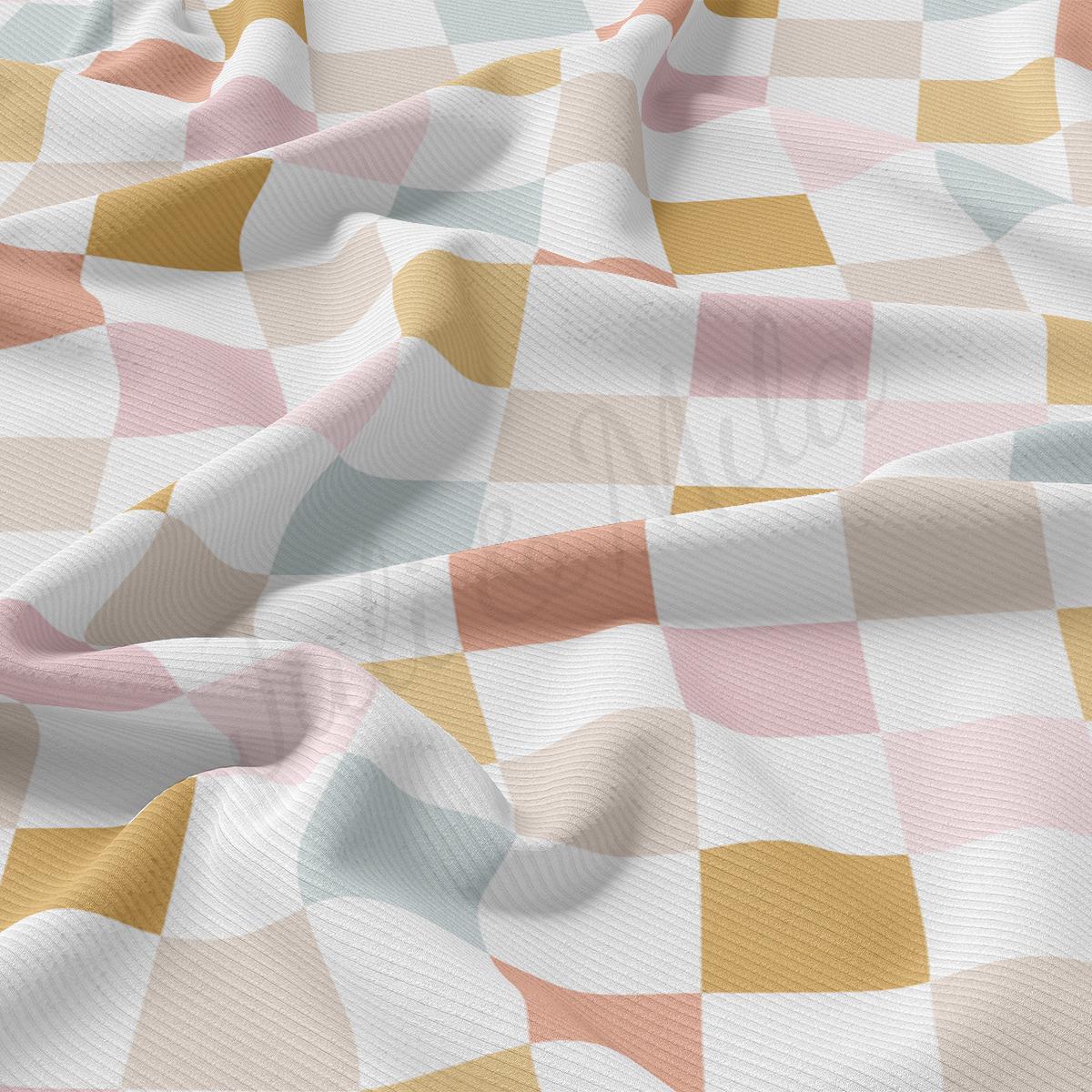 a multicolored checkered fabric with a white background