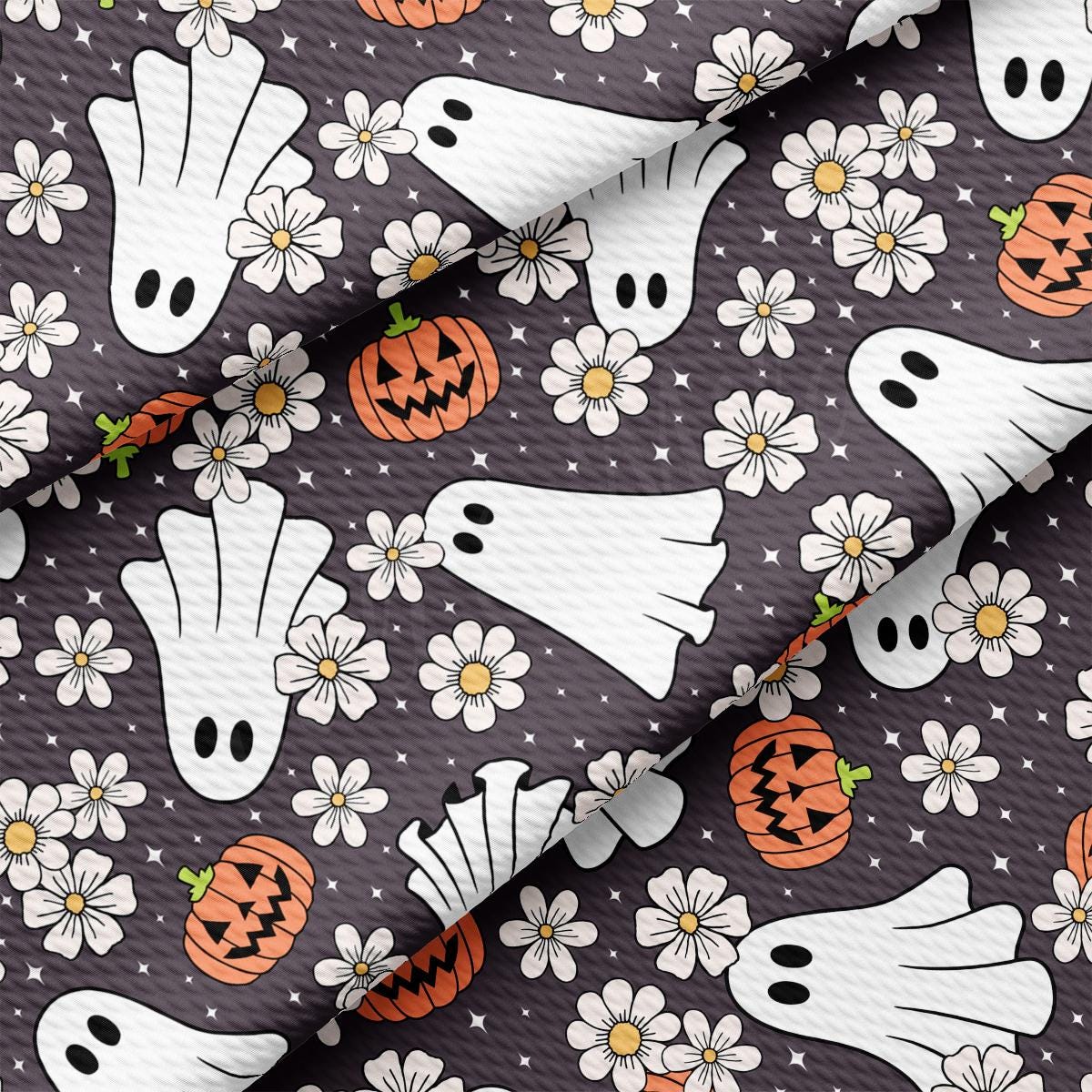 a halloween themed fabric with ghost and flowers