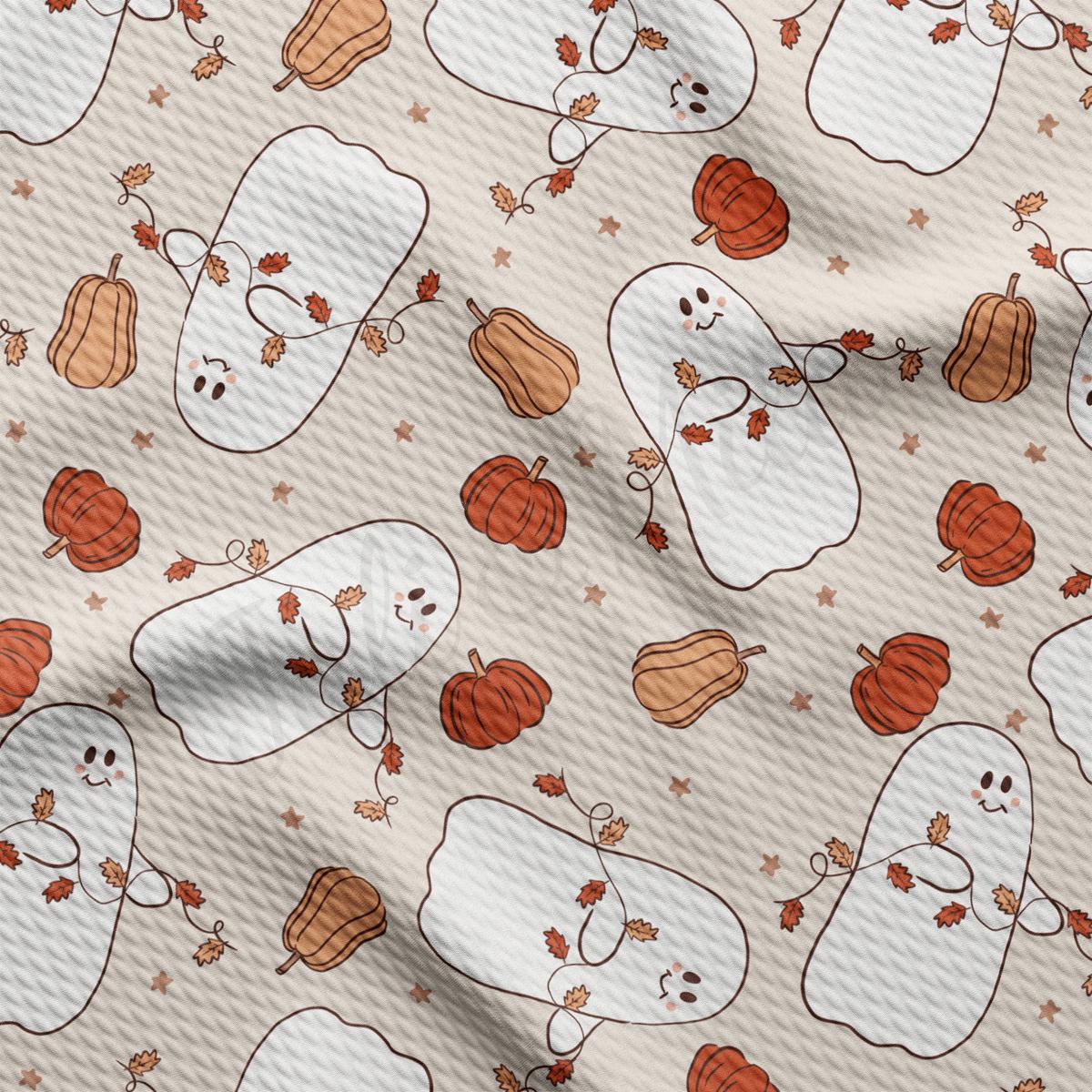 a pattern of ghost and pumpkins on a beige background