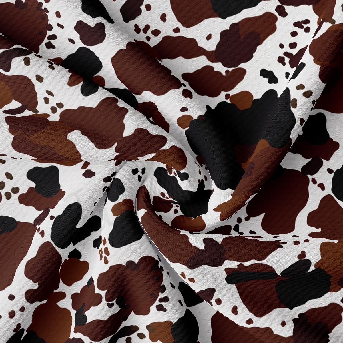a brown and white camouflage print fabric