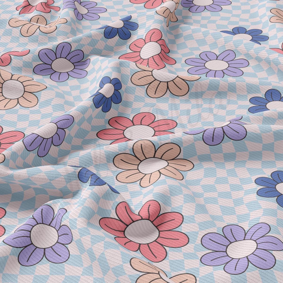 a close up of a flower pattern on a blue background