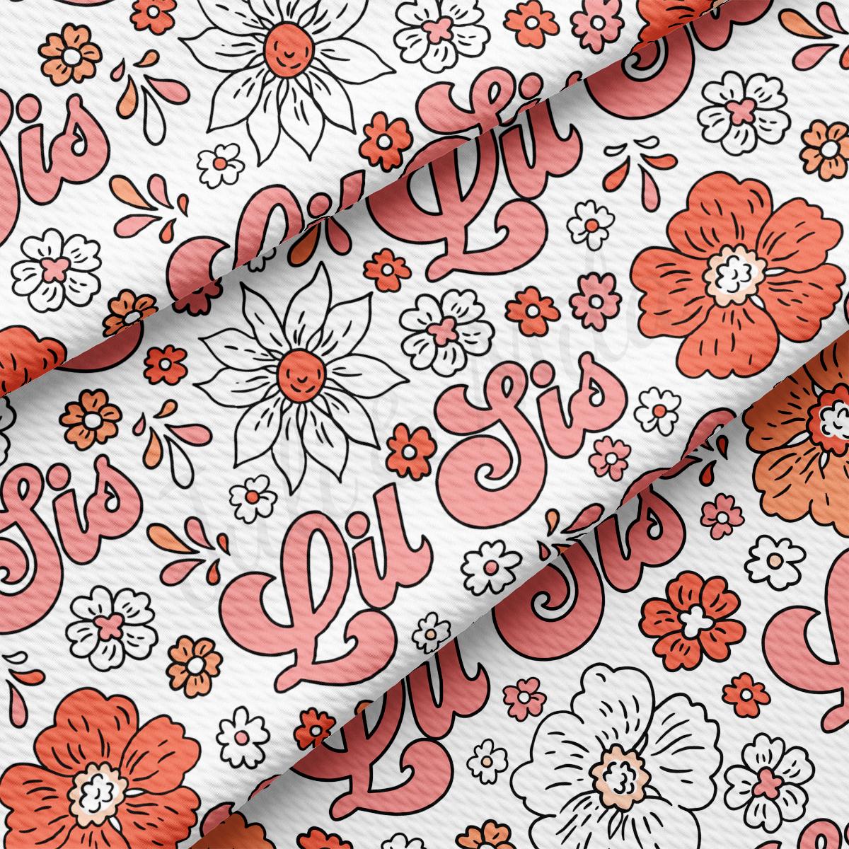 a red and white floral print on a white background