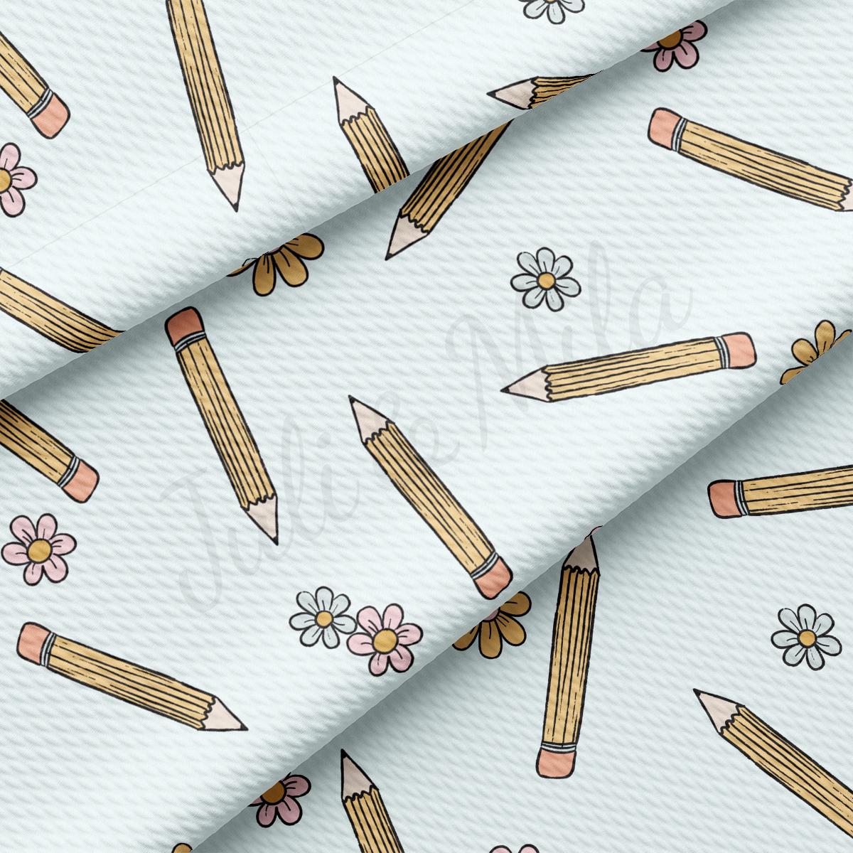 a pattern of pencils and flowers on a white background