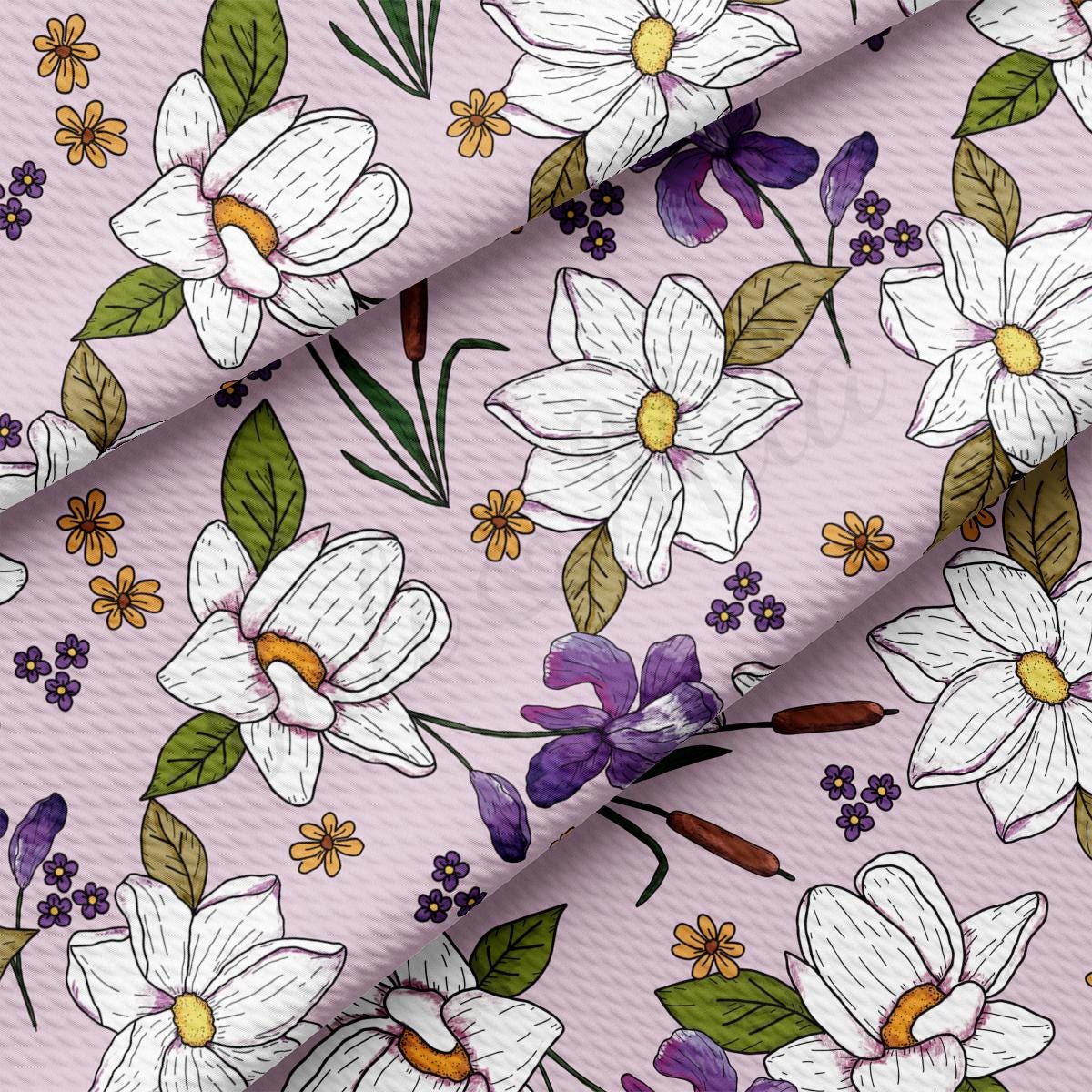a pink background with white flowers and green leaves