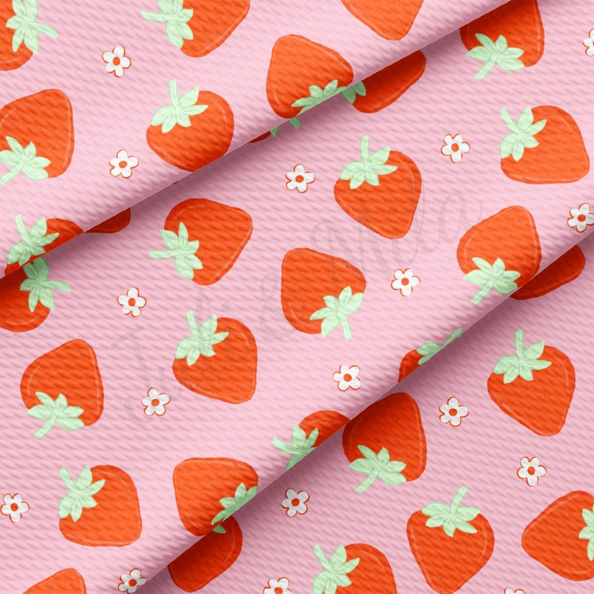 a pink background with orange strawberries on it