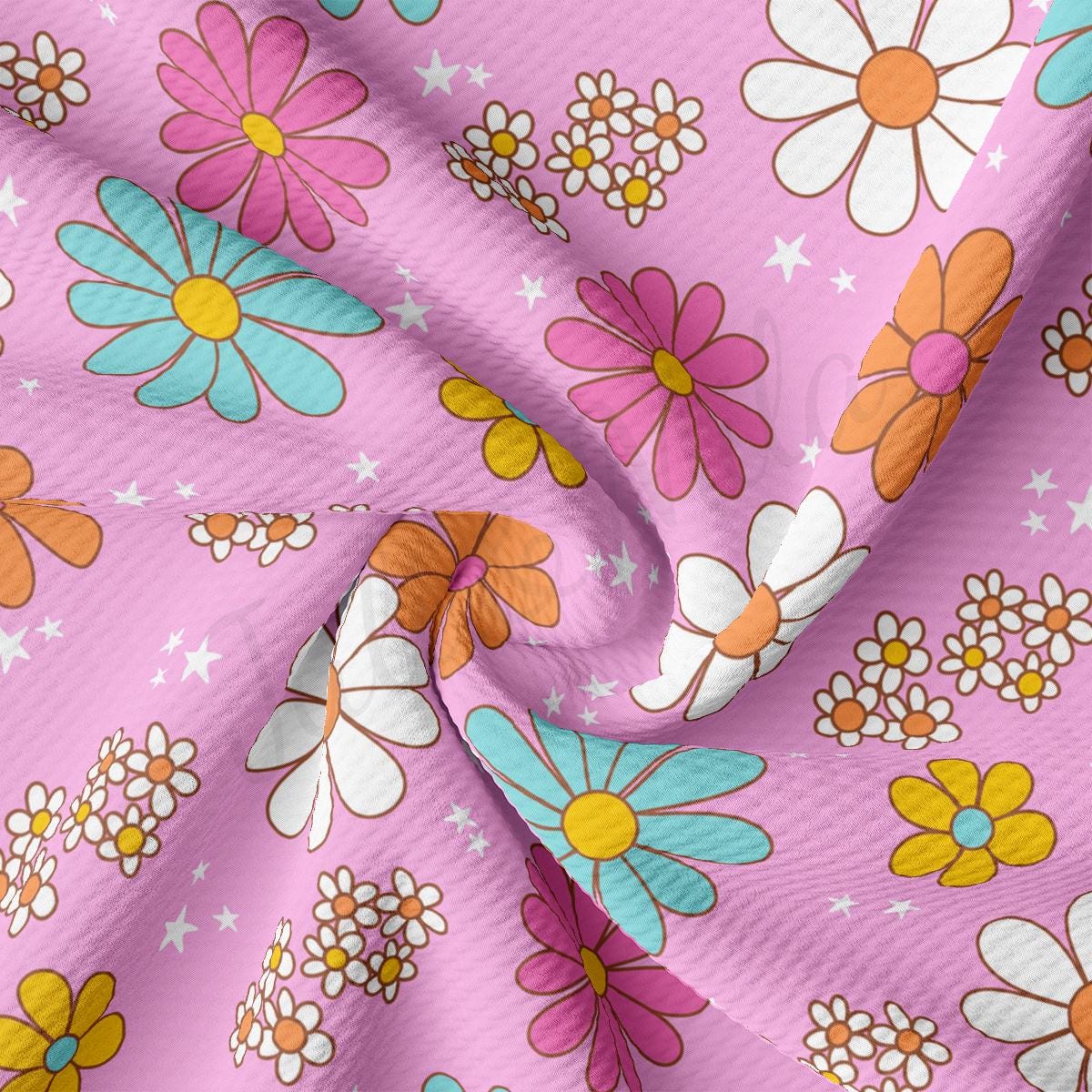 a close up of a pink fabric with flowers on it