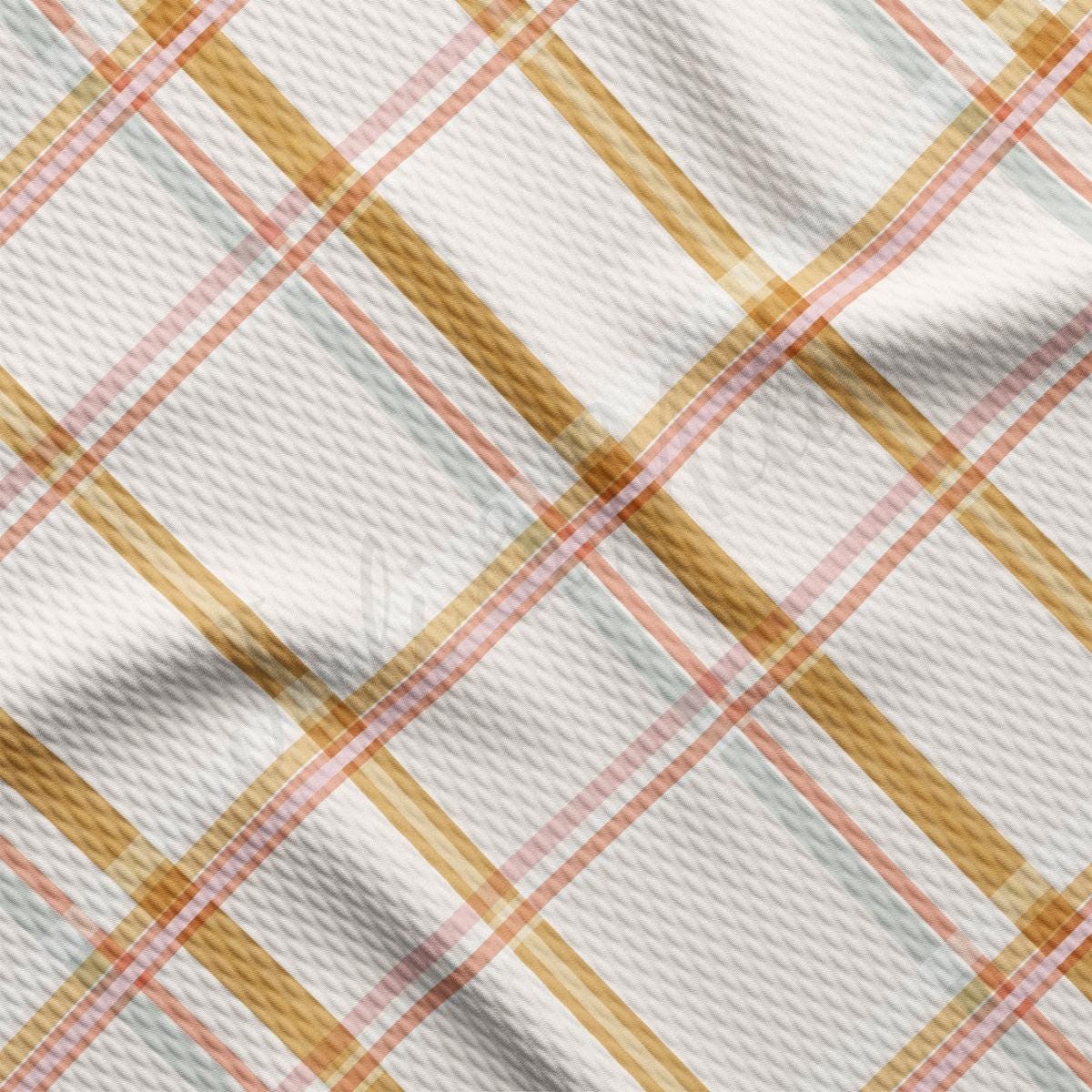 a close up of a white and yellow plaid fabric