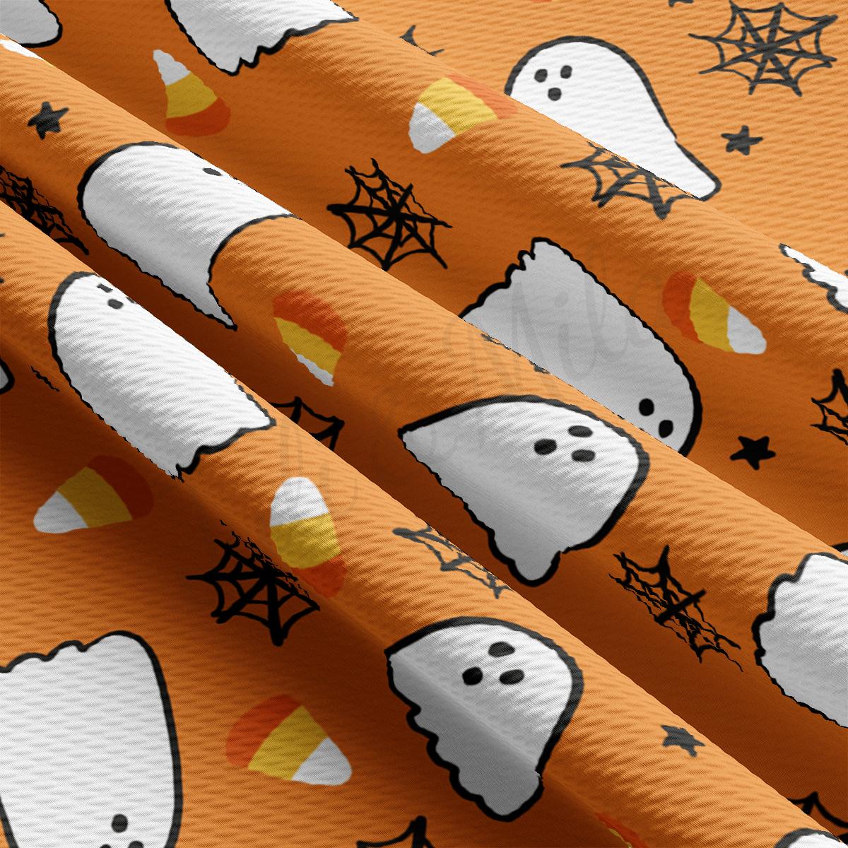 a close up of a pattern of halloween ghostes