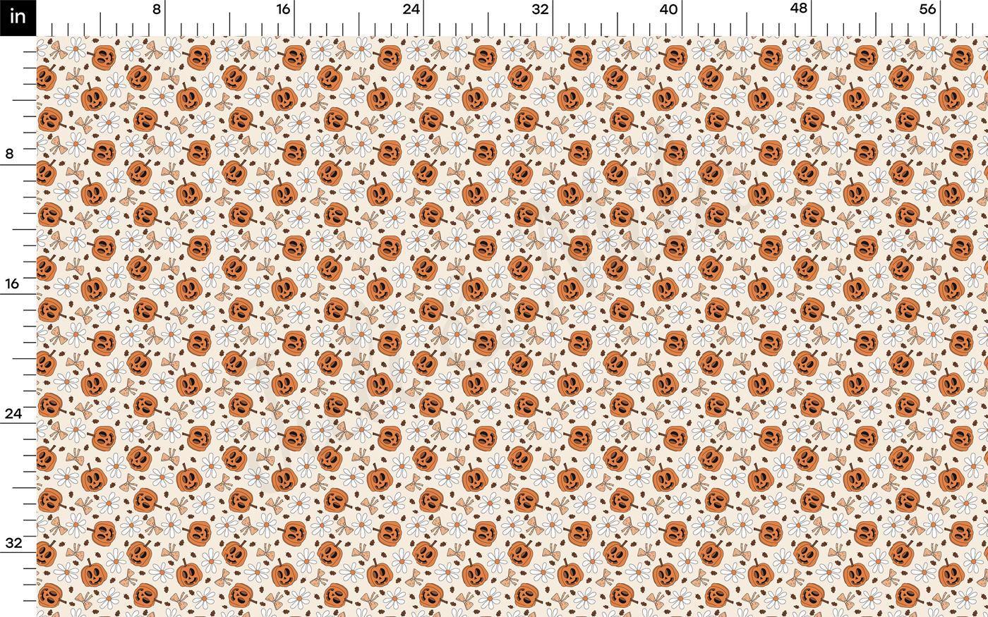 a ruler with an orange and white pattern on it