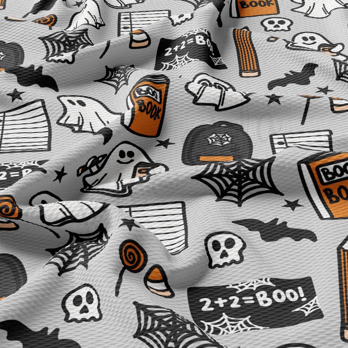 a pattern of halloween themed items on a white background