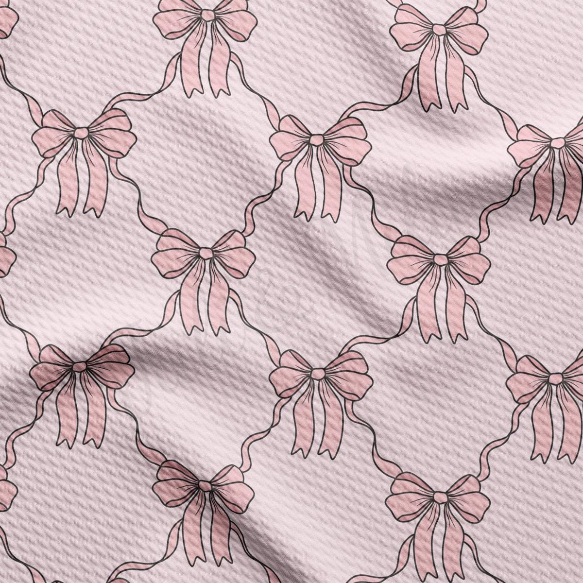 a pattern of pink bows on a white background