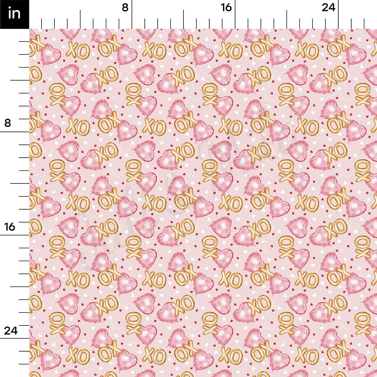 a ruler with a pink and yellow pattern on it