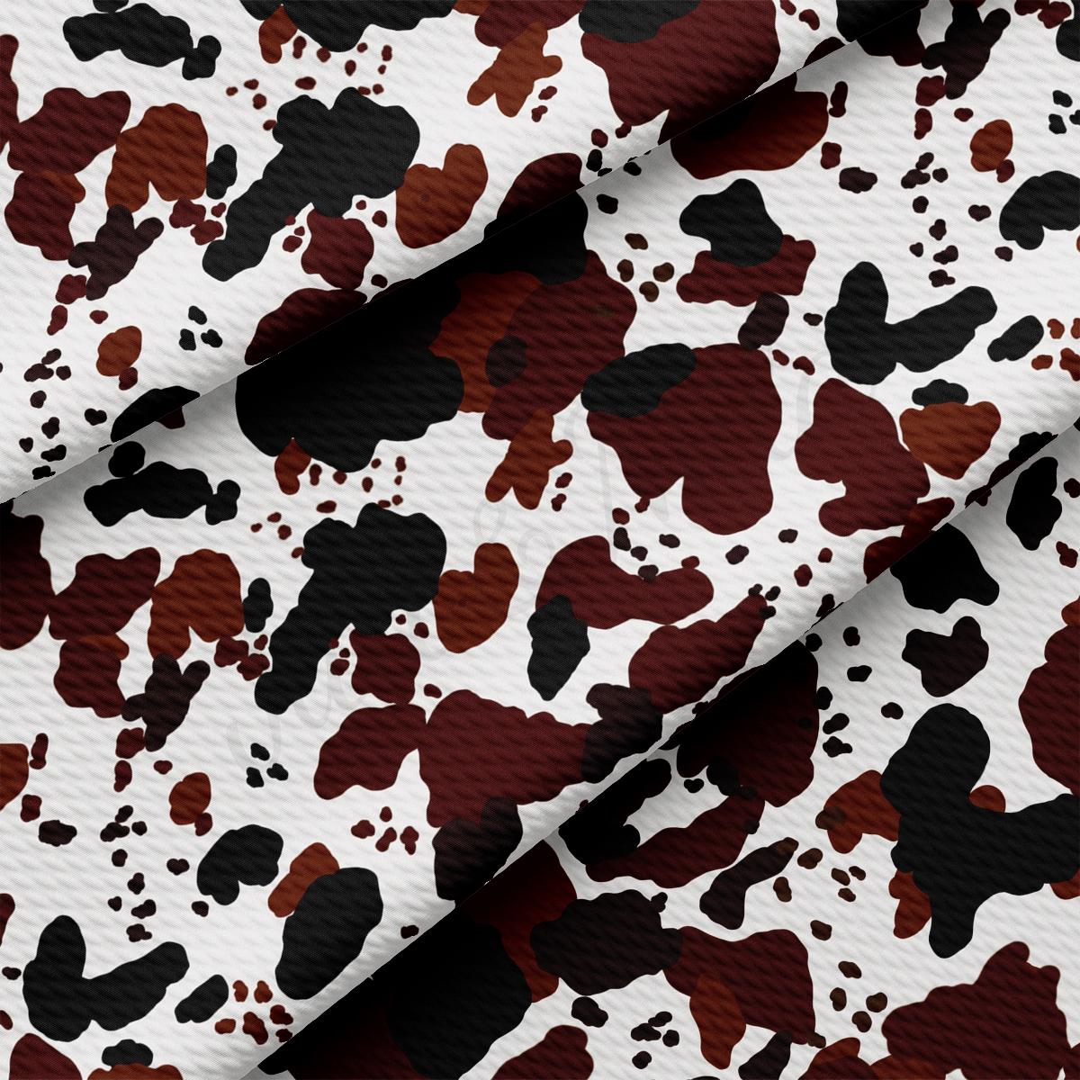 a white and brown camouflage print fabric