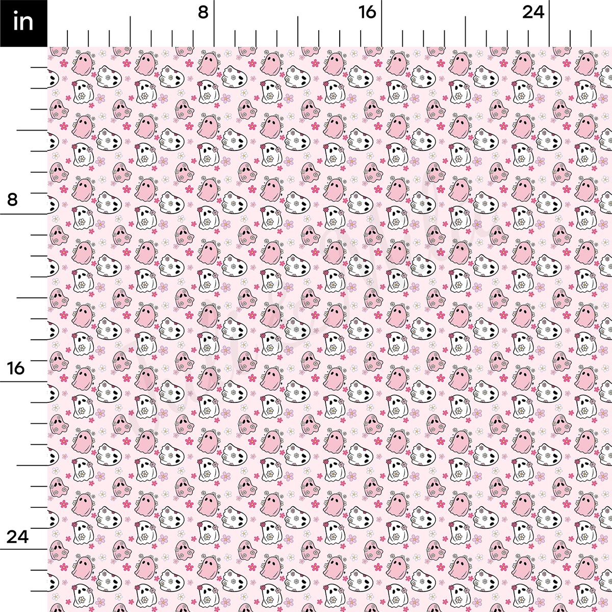 a ruler with a pink and white pattern on it