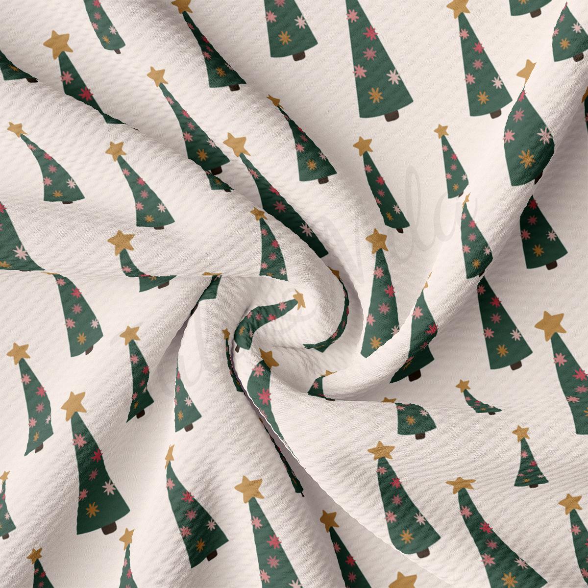 a white background with green and gold christmas trees