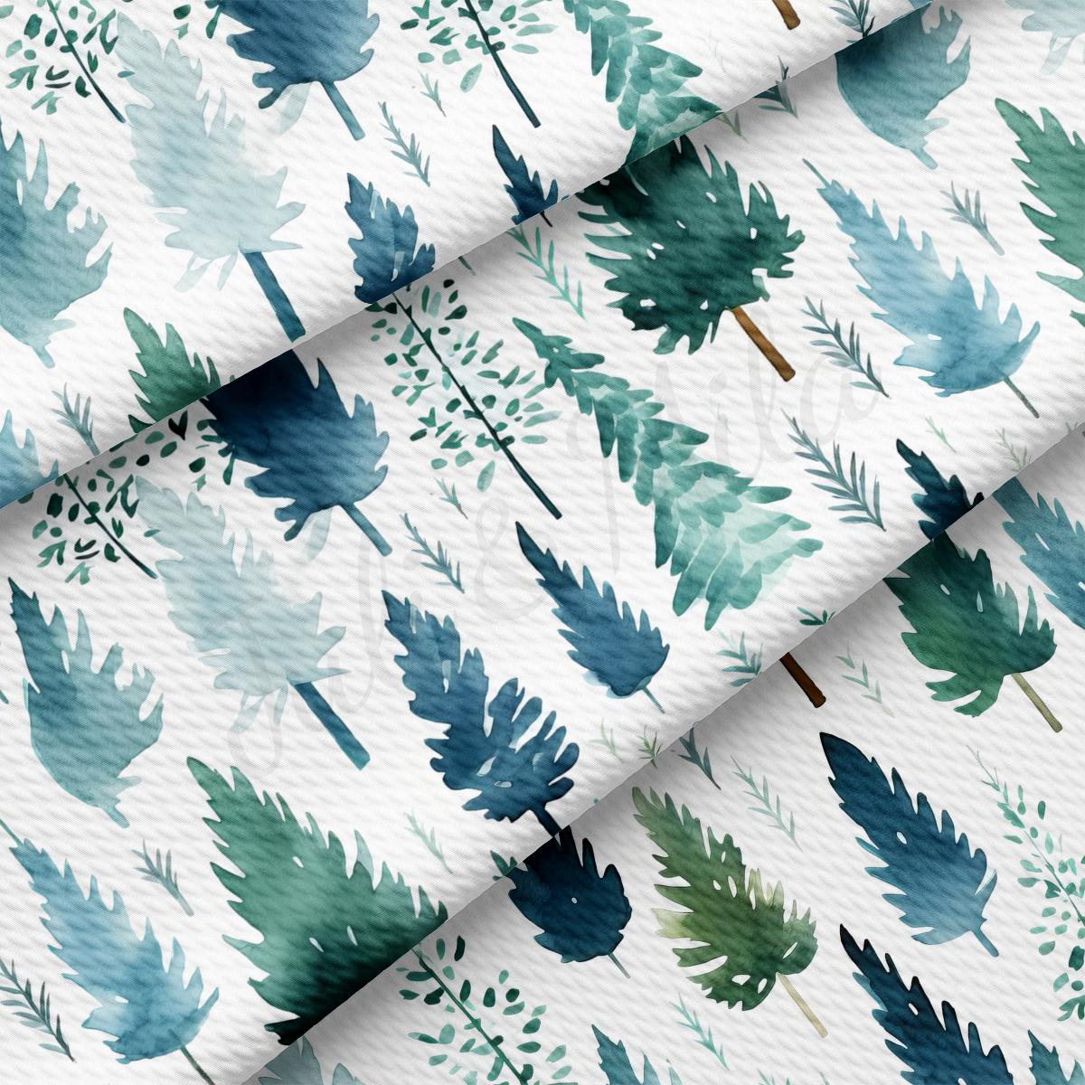 a white background with blue and green leaves