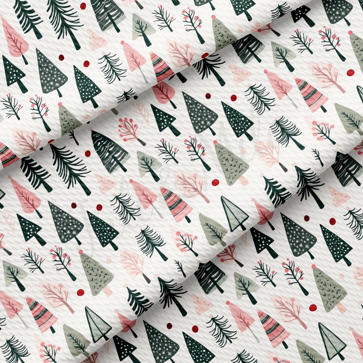 a pattern of christmas trees on a white background