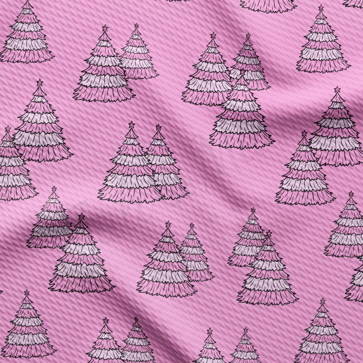 a pink background with black and white christmas trees