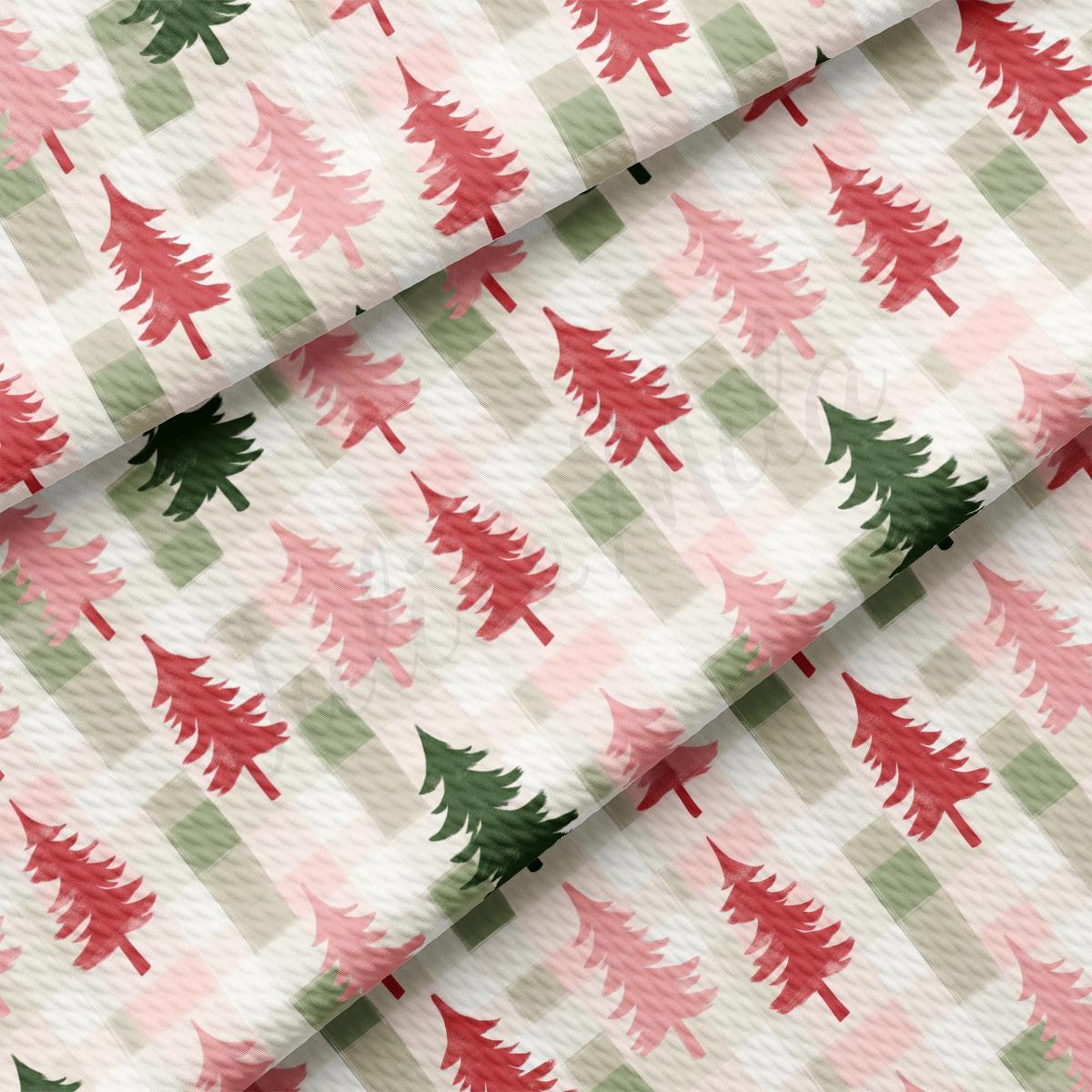 a pink and green christmas tree pattern on a white background