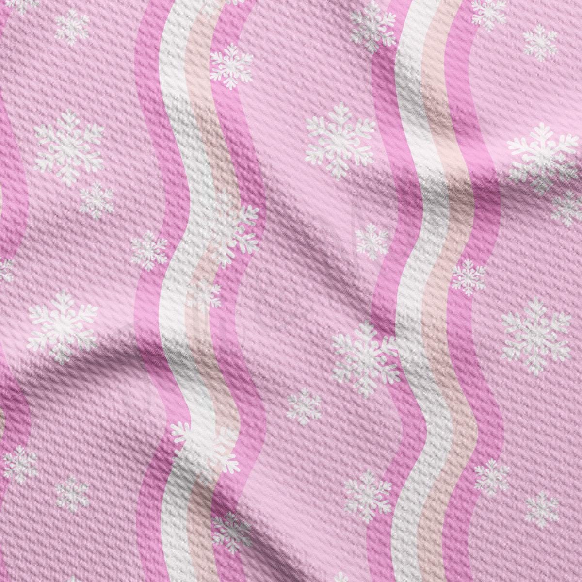 a pink and white background with snowflakes