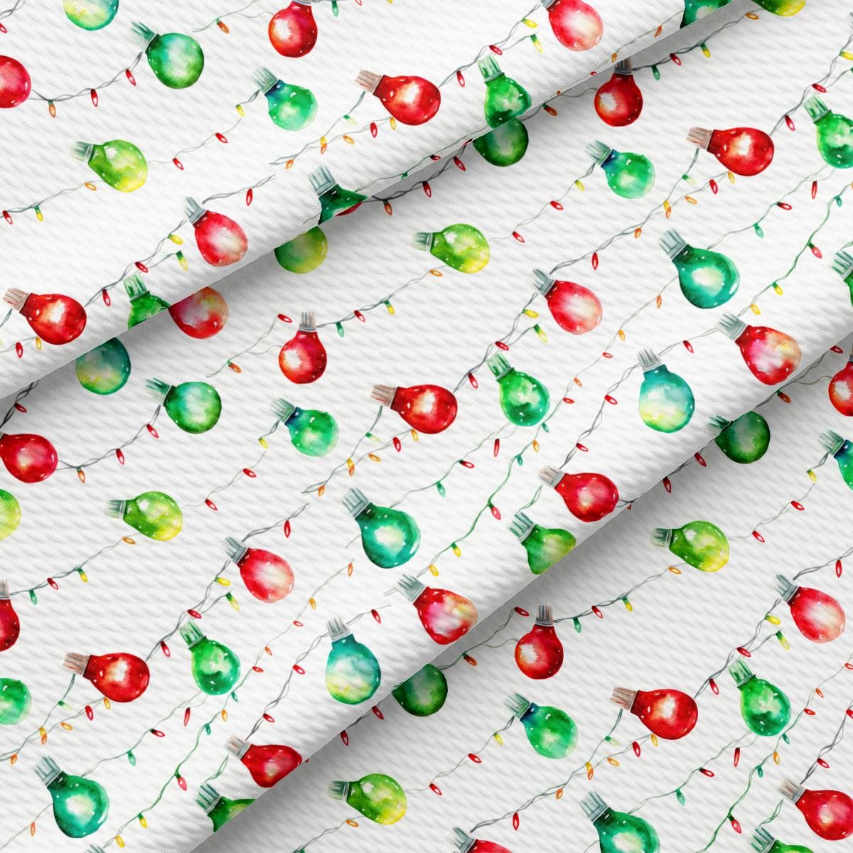 a pattern of christmas lights on a white background